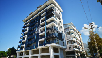Апартаменты в курортном районе Махмутлар планировки 1+1, 60м2 - Ракурс 2