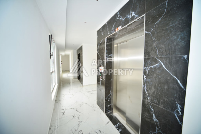 Апартаменты в курортном районе Махмутлар планировки 1+1, 60м2 - Ракурс 2