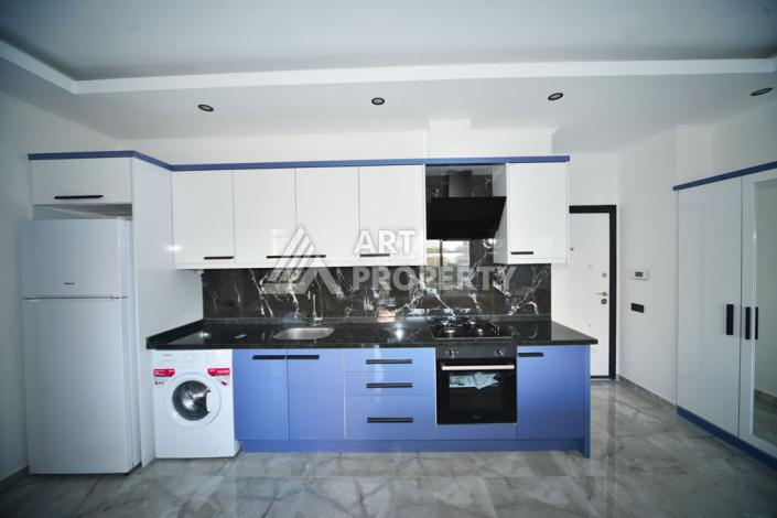 Апартаменты в курортном районе Махмутлар планировки 1+1, 60м2 - Ракурс 3