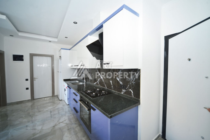 Апартаменты в курортном районе Махмутлар планировки 1+1, 60м2 - Ракурс 4