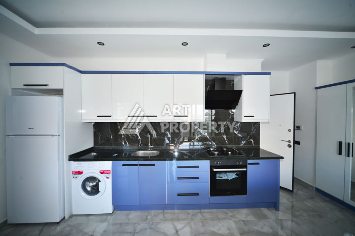 Апартаменты в курортном районе Махмутлар планировки 1+1, 60м2 - Ракурс 6