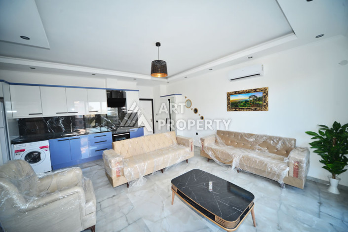 Апартаменты в курортном районе Махмутлар планировки 1+1, 60м2 - Ракурс 7