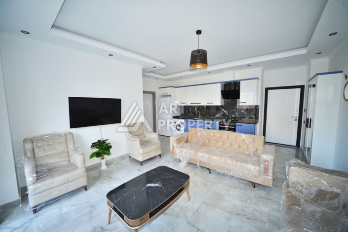 Апартаменты в курортном районе Махмутлар планировки 1+1, 60м2 - Ракурс 9