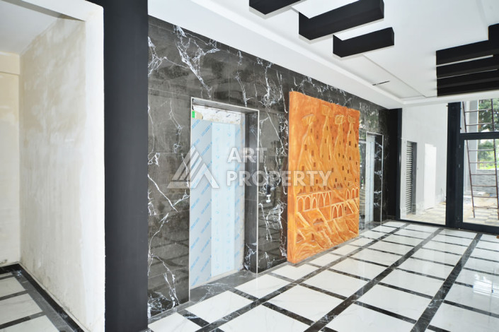 Апартаменты в курортном районе Махмутлар планировки 1+1, 60м2 - Ракурс 18