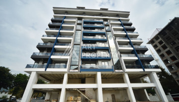 Апартаменты в курортном районе Махмутлар планировки 1+1, 60м2 - Ракурс 23