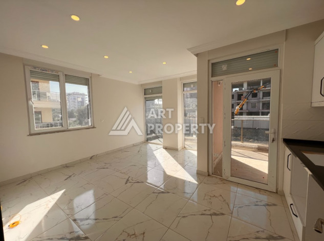 Апартаменты в спокойном живописном районе Авсаллар планировки 1+1, 47м2 - Ракурс 3