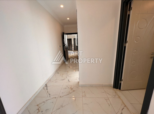 Апартаменты в спокойном живописном районе Авсаллар планировки 1+1, 47м2 - Ракурс 9