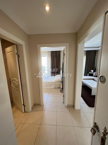 Просторные апартаменты с мебелью в районе Махмутлар планировки 1+1, 65м2 - Ракурс 2