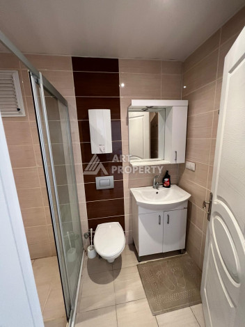 Просторные апартаменты с мебелью в районе Махмутлар планировки 1+1, 65м2 - Ракурс 9