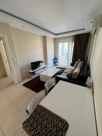 Просторные апартаменты с мебелью в районе Махмутлар планировки 1+1, 65м2 - Ракурс 12