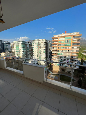 Просторные апартаменты с мебелью в районе Махмутлар планировки 1+1, 65м2 - Ракурс 15