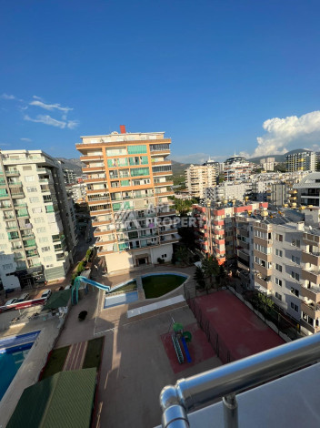 Просторные апартаменты с мебелью в районе Махмутлар планировки 1+1, 65м2 - Ракурс 21