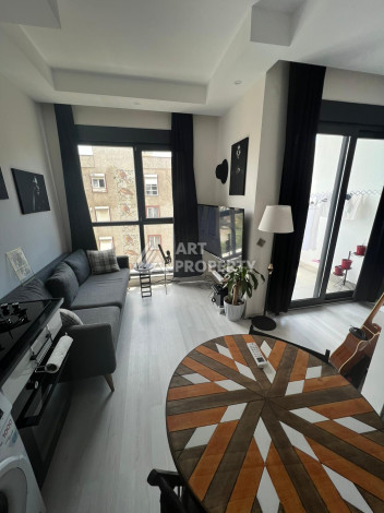 Апартаменты в самом центре Алании планировки 1+1, 55м2 - Ракурс 2