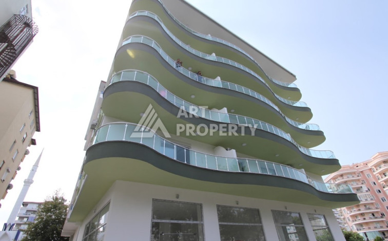 Меблированные апартаменты планировки 2+1 в районе Махмутлар, 110м2 - Ракурс 20