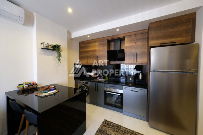 Апартаменты в шикарной резиденции с богатой инфраструктурой в районе Махмутлар, 1+1, 60м2 - Ракурс 2