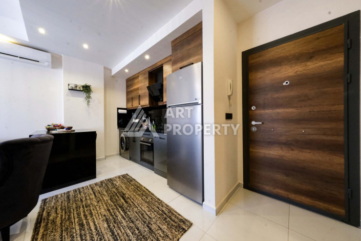 Апартаменты в шикарной резиденции с богатой инфраструктурой в районе Махмутлар, 1+1, 60м2 - Ракурс 5