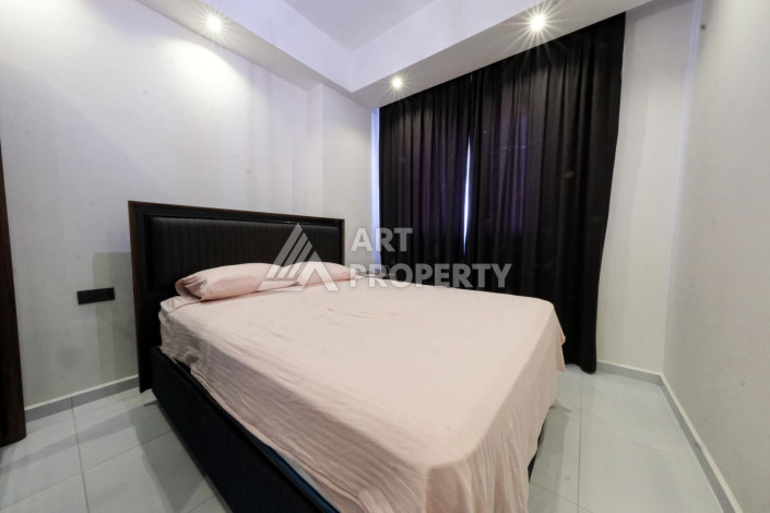 Апартаменты в шикарной резиденции с богатой инфраструктурой в районе Махмутлар, 1+1, 60м2 - Ракурс 8