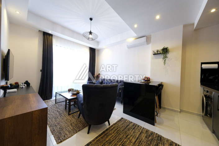 Апартаменты в шикарной резиденции с богатой инфраструктурой в районе Махмутлар, 1+1, 60м2 - Ракурс 10