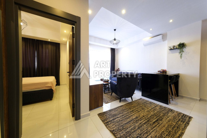 Апартаменты в шикарной резиденции с богатой инфраструктурой в районе Махмутлар, 1+1, 60м2 - Ракурс 11