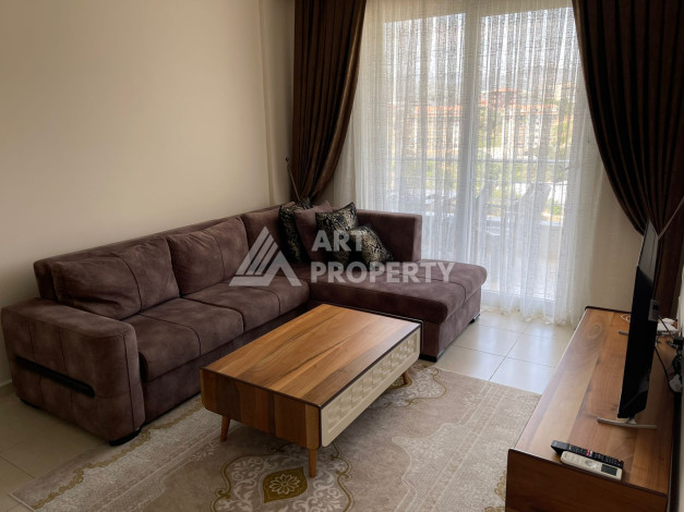 Апартаменты в живописном районе Конаклы планировки 1+1, 55м2 - Ракурс 2