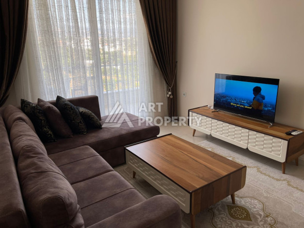 Апартаменты в живописном районе Конаклы планировки 1+1, 55м2 - Ракурс 3