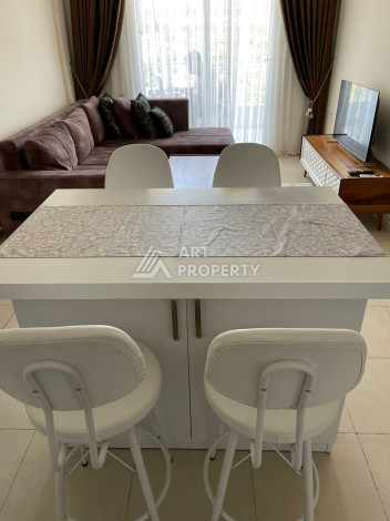 Апартаменты в живописном районе Конаклы планировки 1+1, 55м2 - Ракурс 5