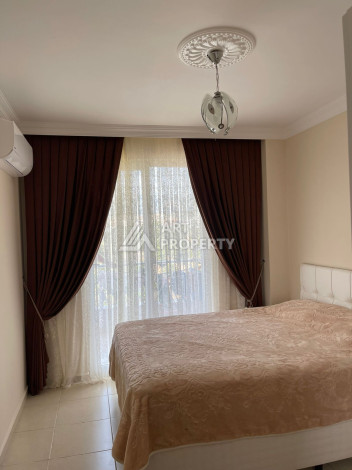 Апартаменты в живописном районе Конаклы планировки 1+1, 55м2 - Ракурс 7