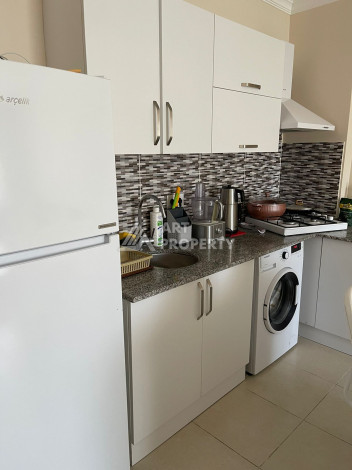 Апартаменты в живописном районе Конаклы планировки 1+1, 55м2 - Ракурс 9