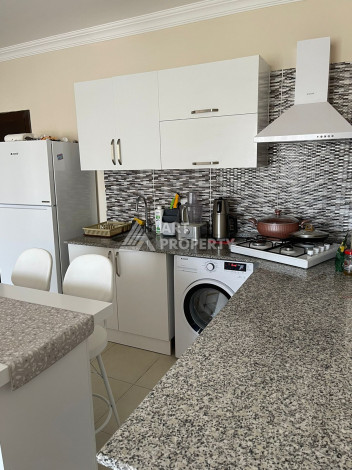 Апартаменты в живописном районе Конаклы планировки 1+1, 55м2 - Ракурс 10