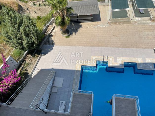 Апартаменты в живописном районе Конаклы планировки 1+1, 55м2 - Ракурс 11