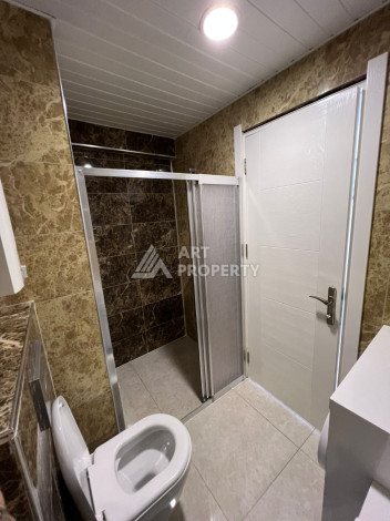 Просторные апартаменты планировки 1+1 в районе Махмутлар, 70м2 - Ракурс 6