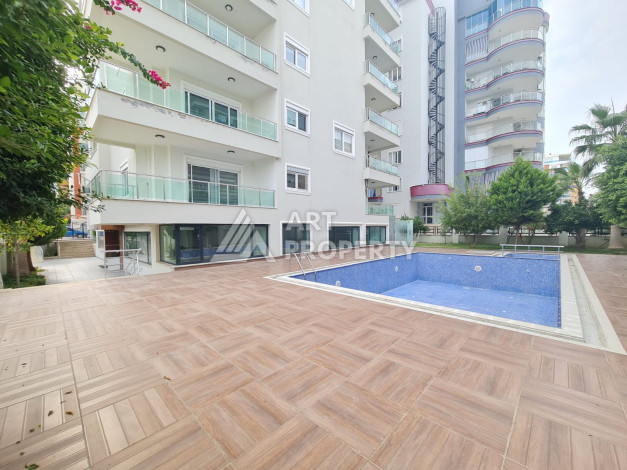 Просторные апартаменты планировки 1+1 в районе Махмутлар, 75м2 - Ракурс 2