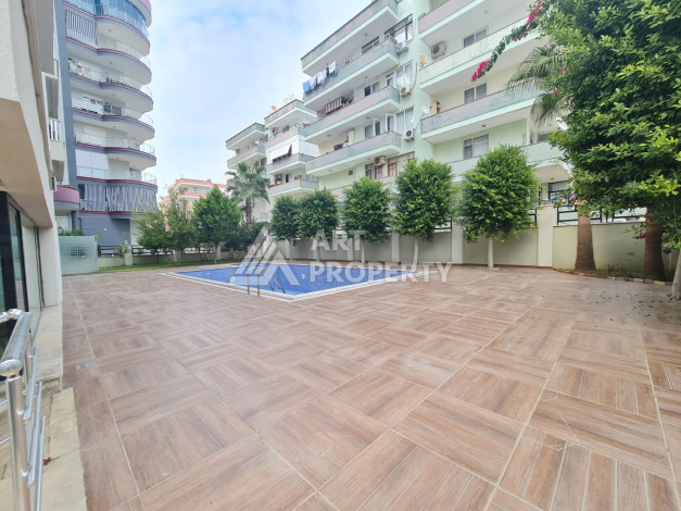 Просторные апартаменты планировки 1+1 в районе Махмутлар, 75м2 - Ракурс 3