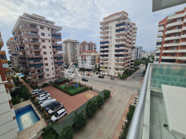 Просторные апартаменты планировки 1+1 в районе Махмутлар, 75м2 - Ракурс 5