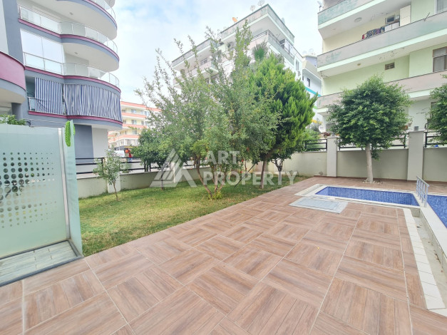 Просторные апартаменты планировки 1+1 в районе Махмутлар, 75м2 - Ракурс 10