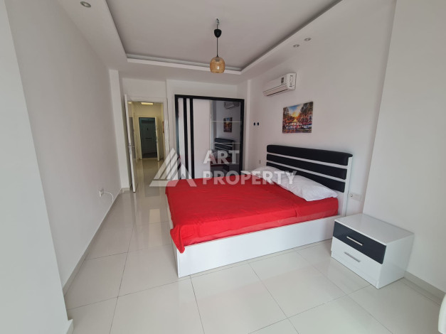 Просторные апартаменты планировки 1+1 в районе Махмутлар, 75м2 - Ракурс 25