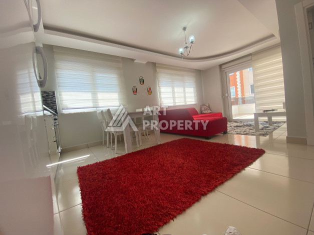 Апартаменты в жилом комплексе с развитой инфраструктурой в районе Махмутлар, планировка 1+1 - Ракурс 3