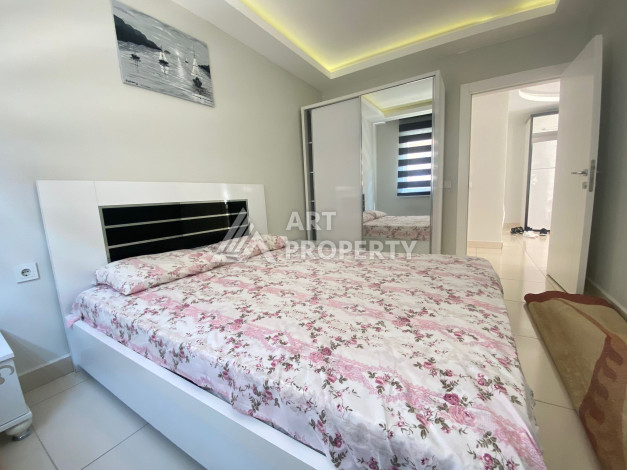 Апартаменты в жилом комплексе с развитой инфраструктурой в районе Махмутлар, планировка 1+1 - Ракурс 7