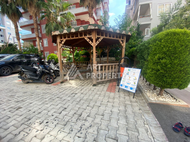 Апартаменты в жилом комплексе с развитой инфраструктурой в районе Махмутлар, планировка 1+1 - Ракурс 8