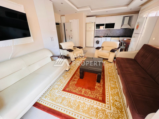 Апартаменты в курортном районе Махмутлар планировки 1+1, 85м2 - Ракурс 5