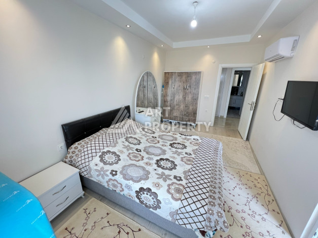 Просторные апартаменты с видом на море в районе Махмутлар планировки 1+1, 60м2 - Ракурс 3