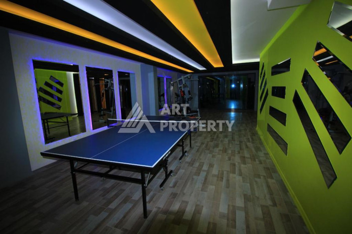 Апартаменты в комплексе с развитой инфраструктурой планировки 1+1 в районе Махмутлар, 65м2 - Ракурс 7