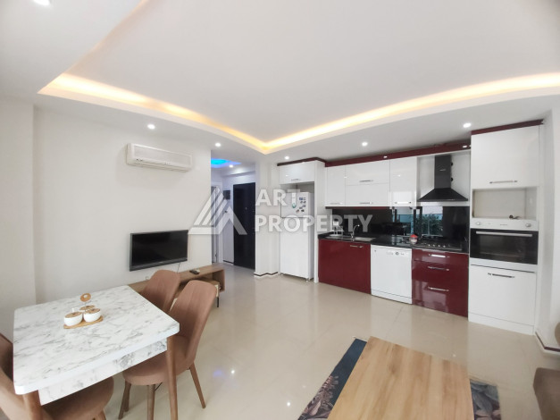 Апартаменты в комплексе с развитой инфраструктурой планировки 1+1 в районе Махмутлар, 65м2 - Ракурс 11