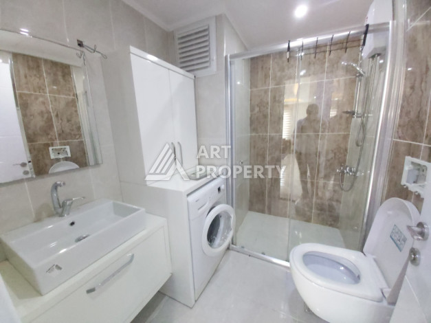 Апартаменты в комплексе с развитой инфраструктурой планировки 1+1 в районе Махмутлар, 65м2 - Ракурс 13