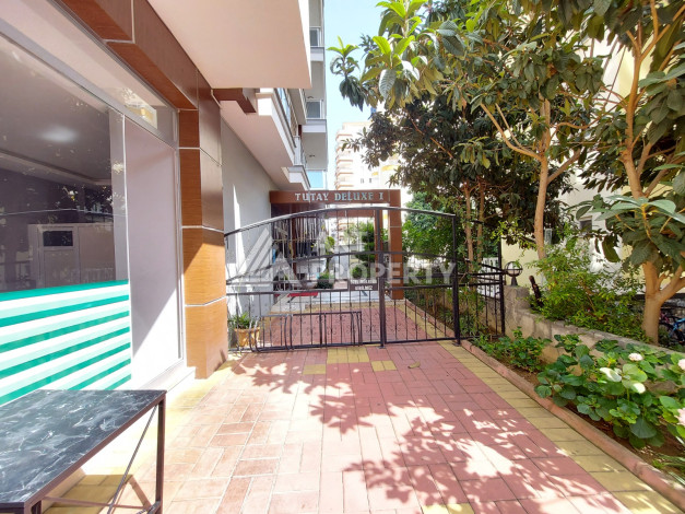 Меблированные апартаменты в курортном районе Махмутлар планировки 1+1, 65м2 - Ракурс 17