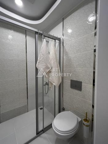 Роскошная квартира планировки 1+1 в районе Махмутлар, 75м2 - Ракурс 5