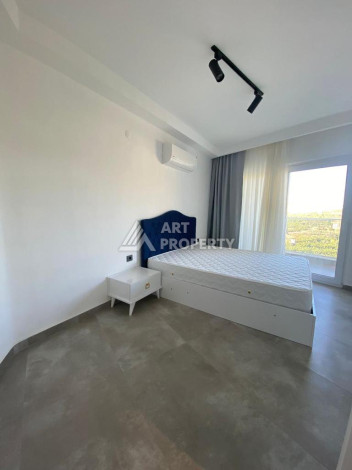 Апартаменты в шикарном жилом комплексе в экологичном районе Каргыджак планировки 2+1 - Ракурс 3