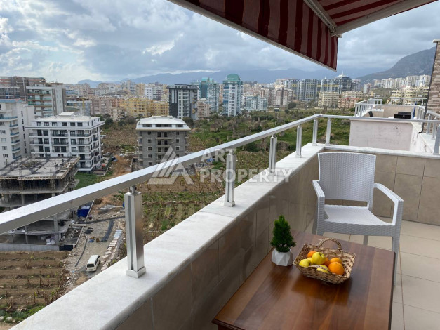 Квартира с шикарной террасой и видом на город и море в районе Махмутлар планировки 2+1, 110м2 - Ракурс 8