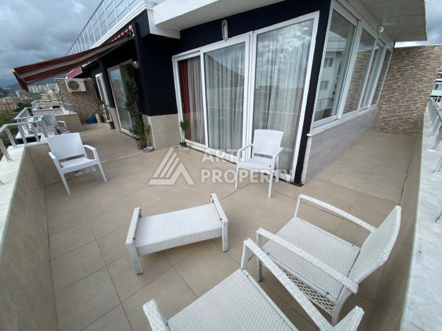 Квартира с шикарной террасой и видом на город и море в районе Махмутлар планировки 2+1, 110м2 - Ракурс 9