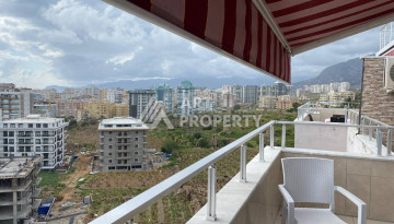 Квартира с шикарной террасой и видом на город и море в районе Махмутлар планировки 2+1, 110м2 - Ракурс 13